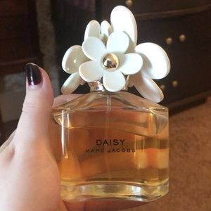 3.4 oz. Daisy by Marc Jacobs & roller